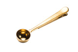 Vintage gold clip spoon