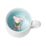 pink piglet in cup